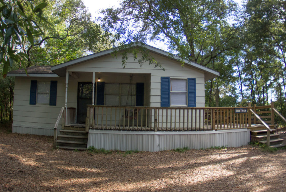 Image of the outside of The Ginnie Cottage at Ginnie Springs in High Springs, FL.
